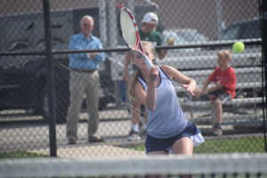 Tynan hits forehand